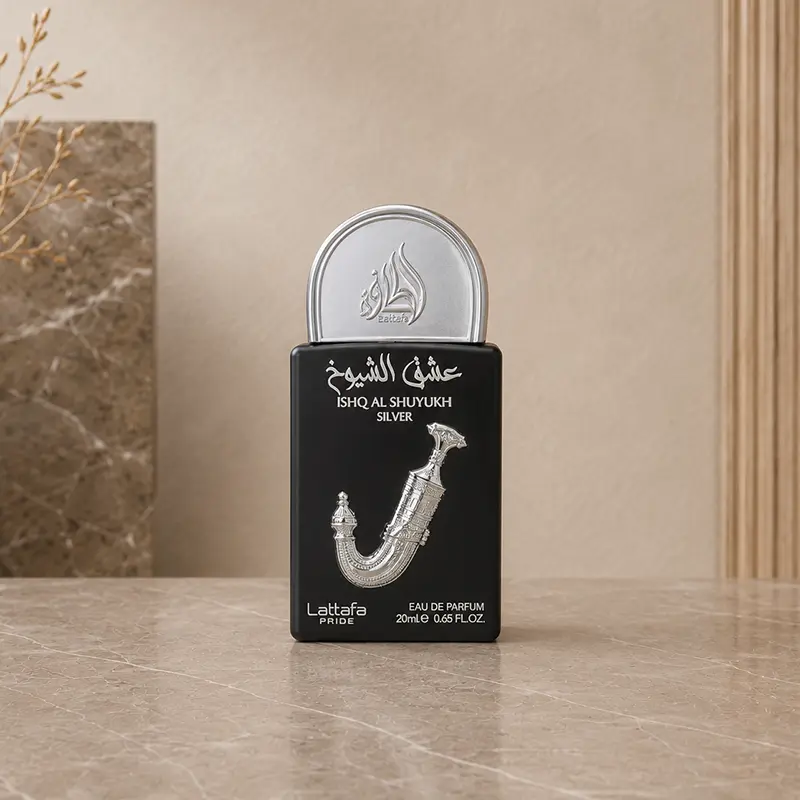 Black Ishq Al Shuyukh Silver 20 ml Eau de Parfum travel bottle with silver cap.