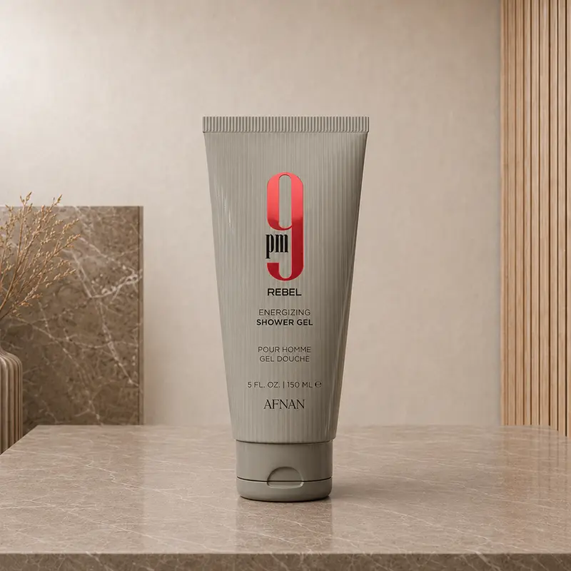 Silver 9PM Rebel 150 ml shower gel tube displayed upright on a neutral stone surface