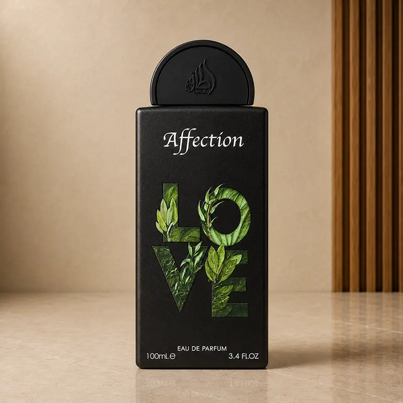 Tall black Affection Eau de Parfum bottle with green LOVE leaf artwork and rounded black cap.