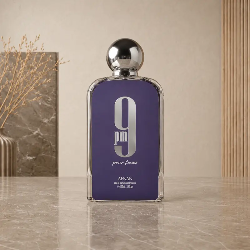Purple 100 ml Afnan 9 PM Pour Femme Eau de Parfum bottle with silver cap.