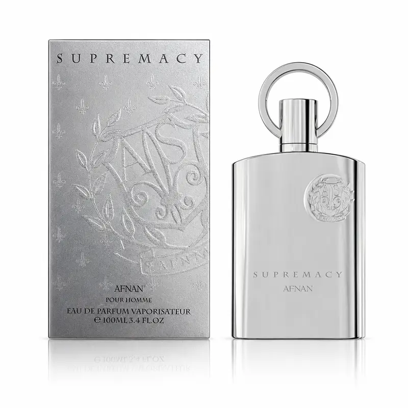 Afnan Supremacy Silver 100ml bottle and embossed box appear on white with soft shadows and reflections