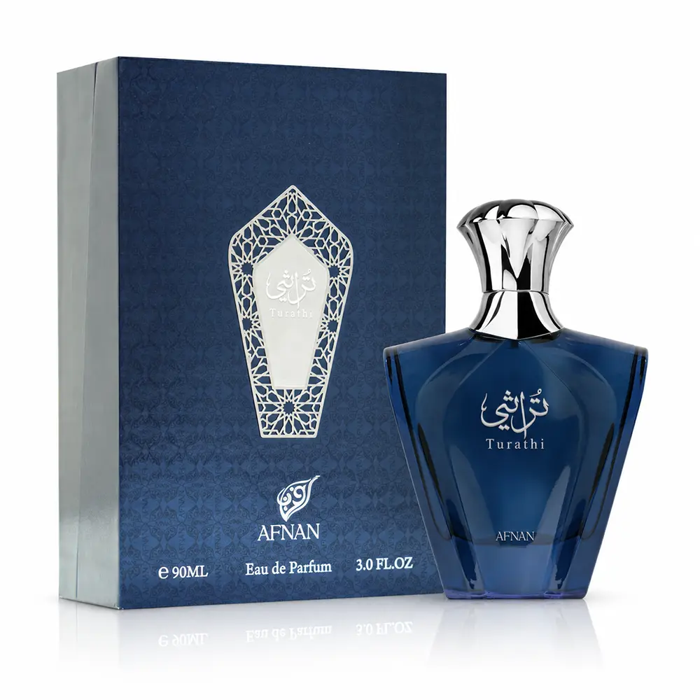 Afnan Turathi Blue box and navy bottle displayed together on white with a soft reflection.