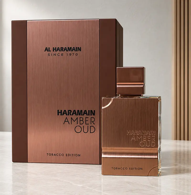 Al Haramain Amber Oud Tobacco Edition box and bottle in a front-facing studio presentation.