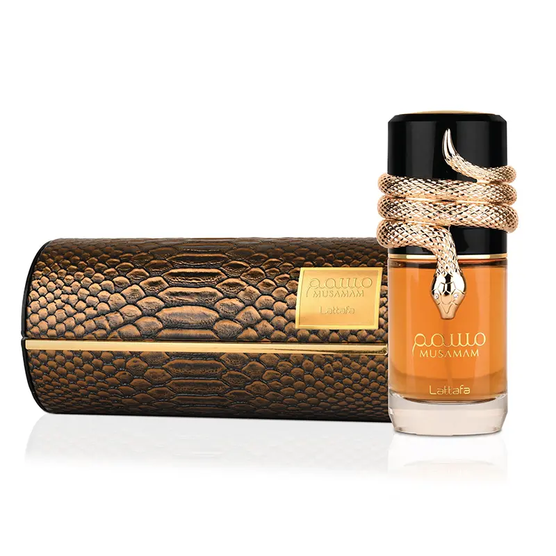 Elegant product pairing featuring Lattafaa Musamam bottle beside its signature textured case.
