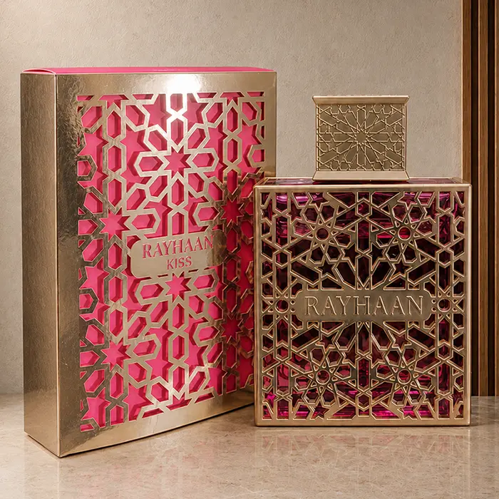 Rayhaan Kiss box and bottle shown together at a slight angle with gold lattice detailing.