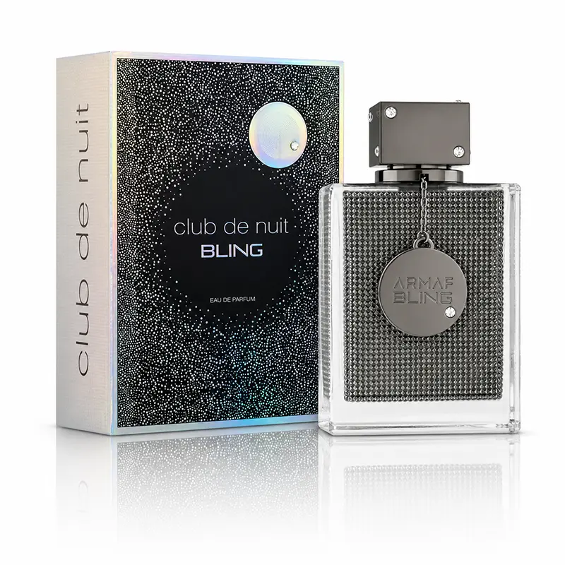 Bottle and box of Armaf Club de Nuit Bling 75 ml Eau de Parfum on a white reflective background