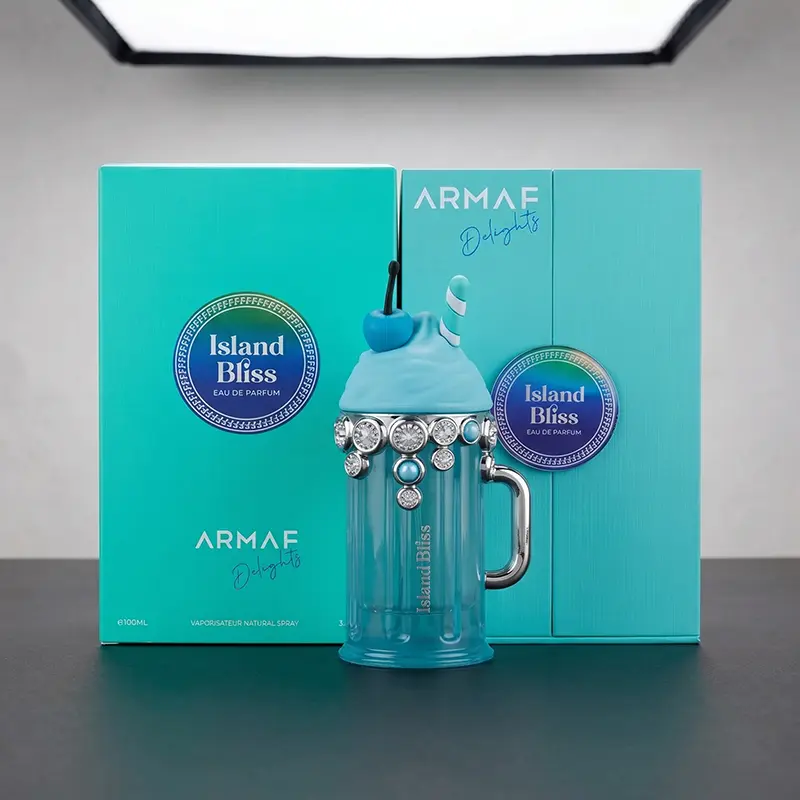 Studio composition featuring Armaf Island Bliss Eau de Parfum bottle and presentation box.