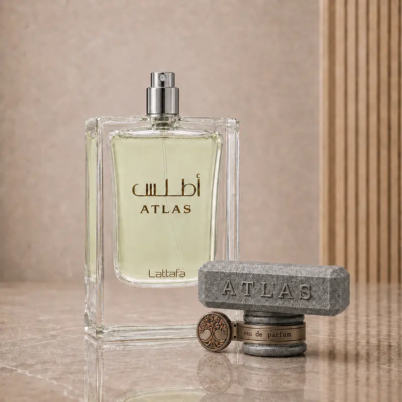 Lattafa Atlas bottle with exposed spray nozzle and detached textured cap with round neck