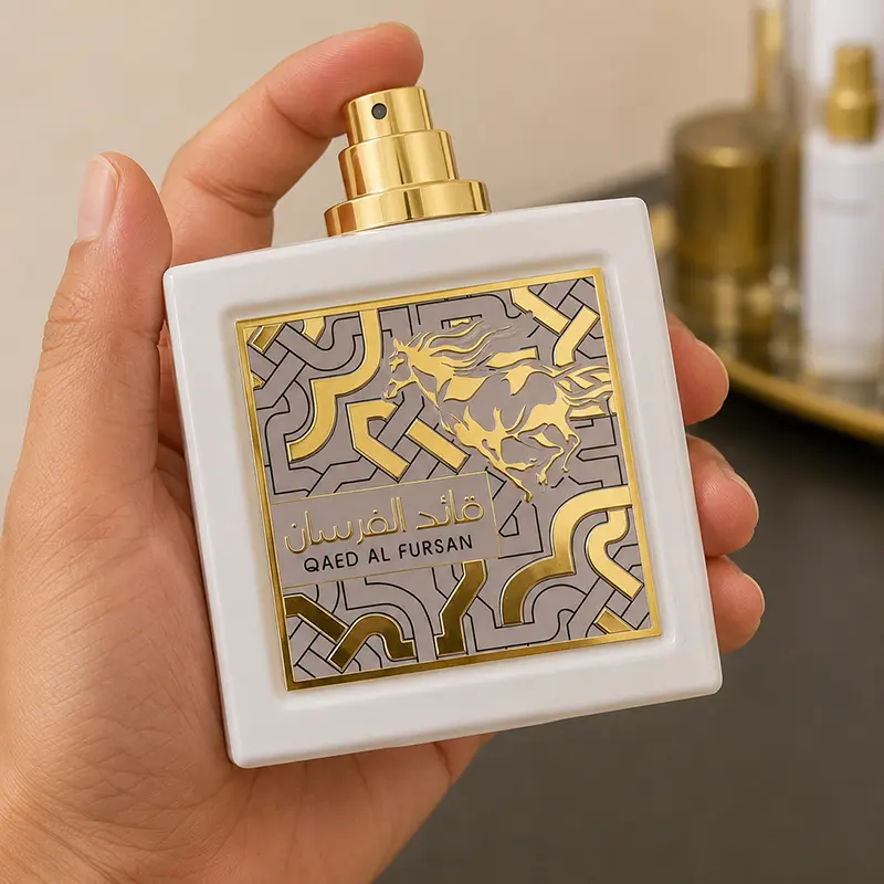 Closeup of the premium atomizer and metallic spray nozzle of the parfum bottle.