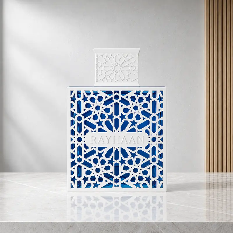 Front of Rayhaan Azul bottle with white geometric lattice over blue glass and a matching patterned cap.