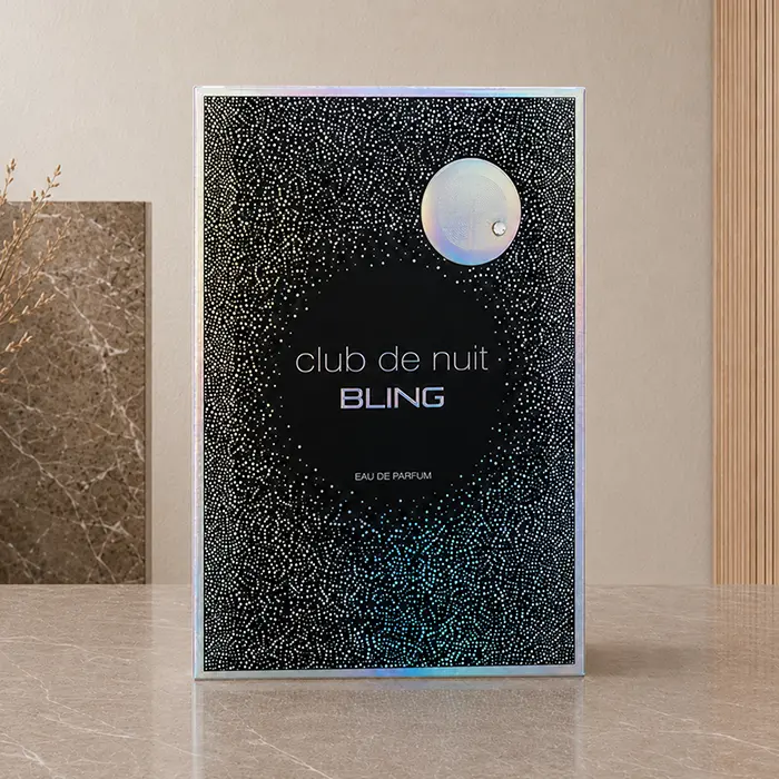 Black Club de Nuit Bling Eau de Parfum box photographed from the front, with dotted and iridescent details