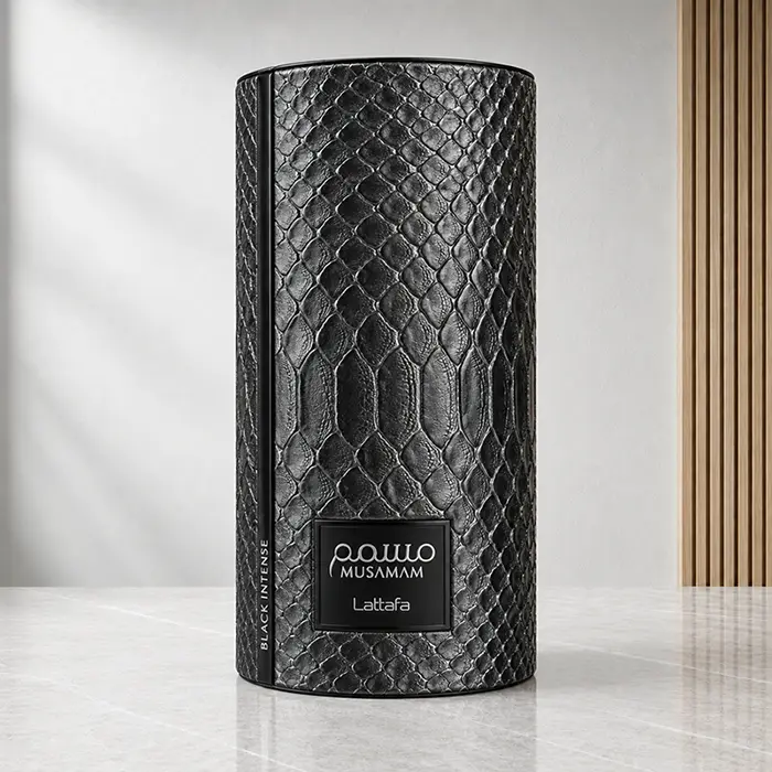 Musamam Black Intense presentation case upright, showing the black reptile-style texture and front plaque.