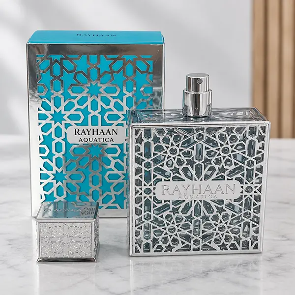 Rayhaan Aquatica perfume bottle, box and atomizer on a marble surface