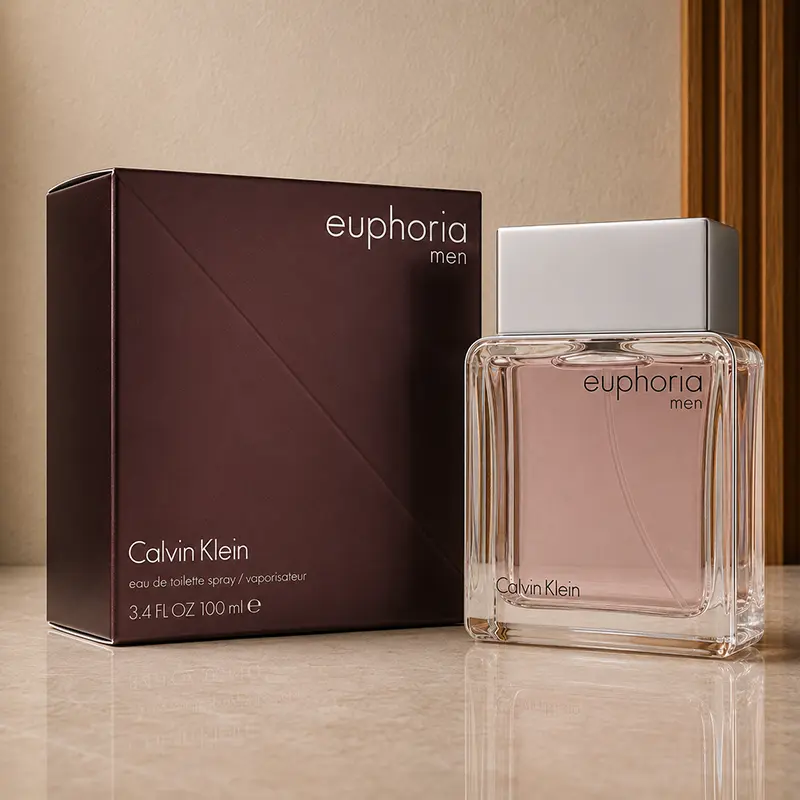 Calvin Klein Euphoria Men bottle and burgundy box photographed together at an angle in a neutral studio.