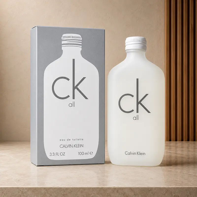 Bottle and grey box for Calvin Klein CK All in an angled studio view