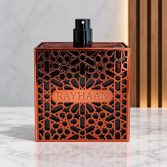 Uncapped Rayhaan Crimson bottle showing its black spray atomiser above the red geometric front.