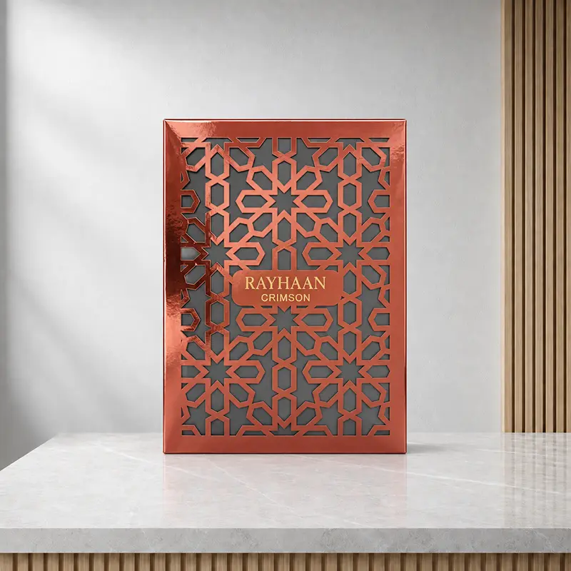 Front of the Crimson perfume carton, showing its red geometric pattern and central name panel.