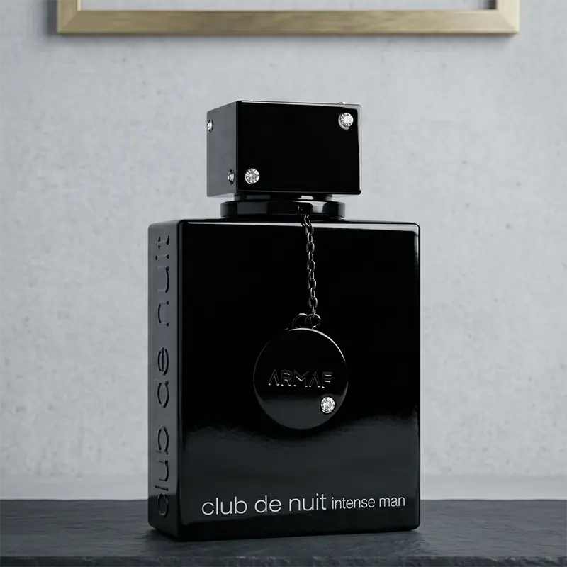 Iconic black glass bottle with silver accents for Armaf Club de Nuit Intense Man, a premium European fragrance staple.
