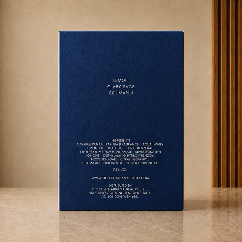 Rear of the dark blue Dolce&Gabbana Pour Homme box with printed ingredient and distributor text.
