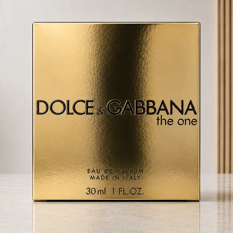 Reflective gold Dolce&Gabbana The One Eau de Parfum box shown from the front