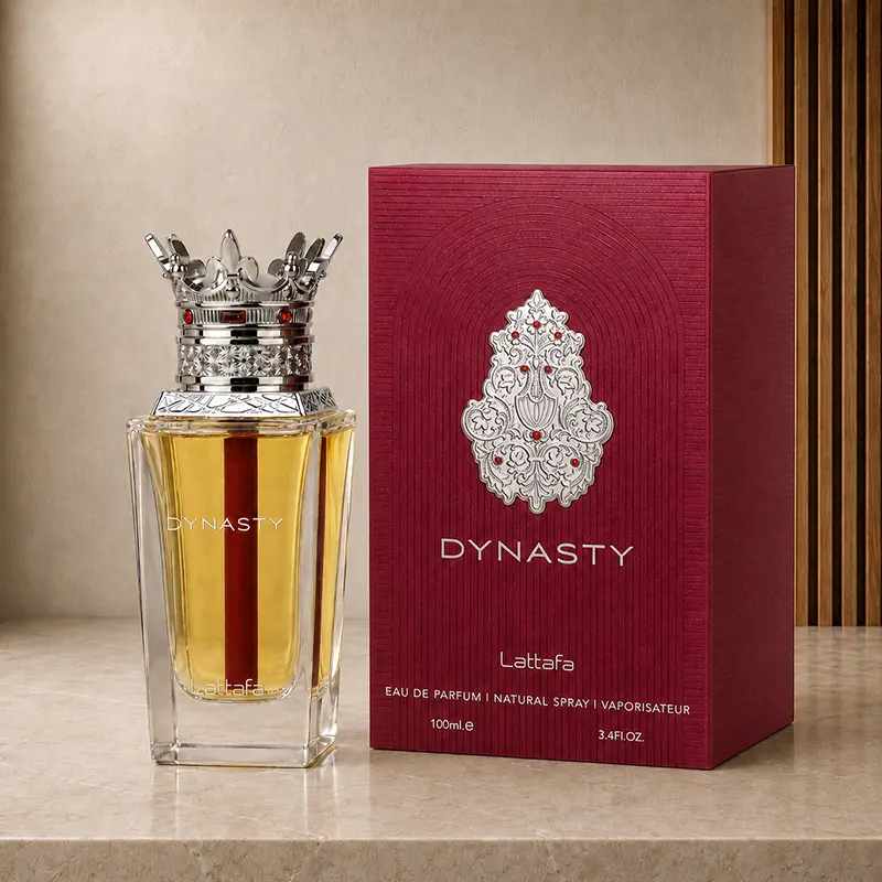 Dynasty bottle beside its red presentation box in an angled studio product view