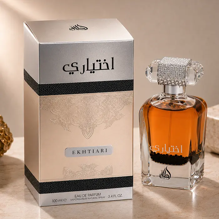 Macro closeup focusing on the premium metallic cap and crafted atomizer of the Ekhtiari fragrance.