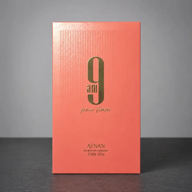 Macro closeup of the textured luxury box design and metallic branding for Afnan 9 AM.