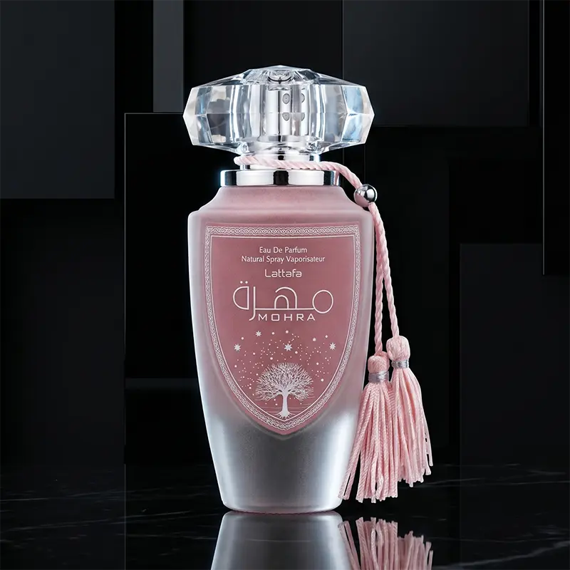 Elegant pink glass bottle presentation of Lattafa Mohra Silky Rose for premium women's fragrance collectors.