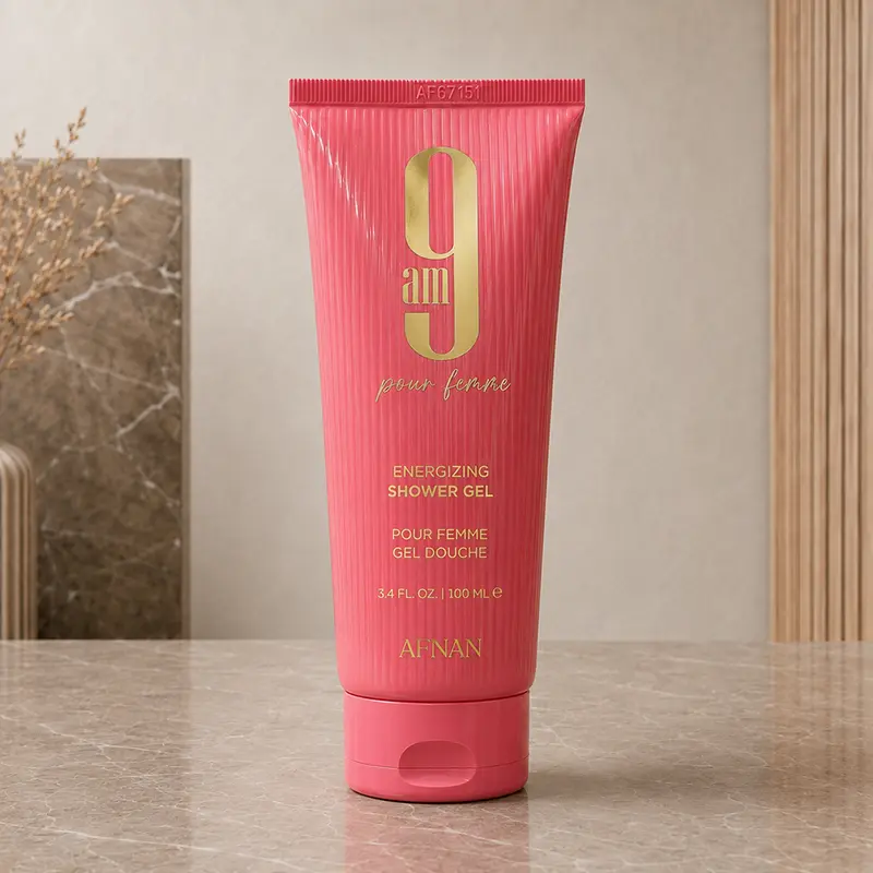 Afnan 9 AM Pour Femme Energizing Shower Gel 100ml in a pink tube with gold lettering