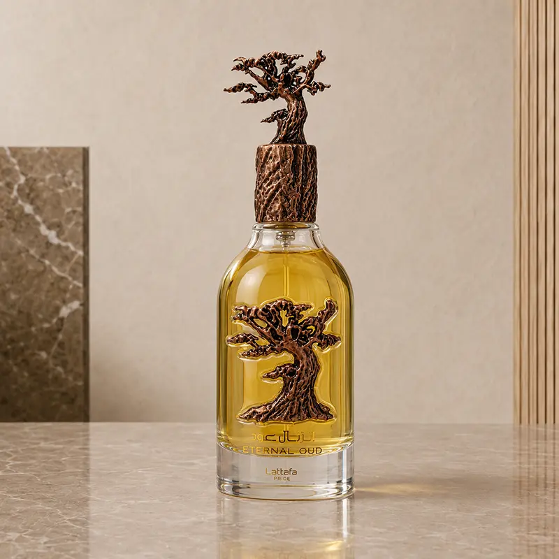 Golden liquid in the Lattafa Eternal Oud bottle with bronze tree detail and sculpted cap
