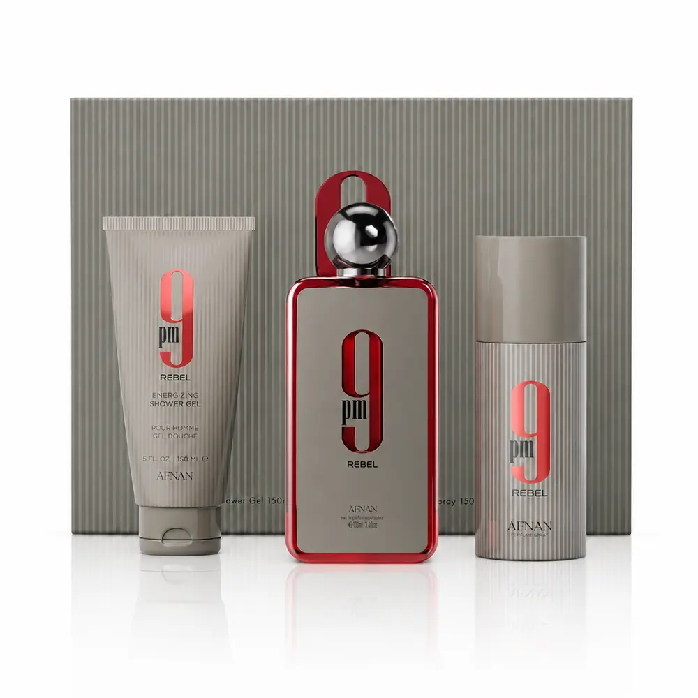 Complete Afnan 9PM Rebel gift set arranged in front of its presentation box