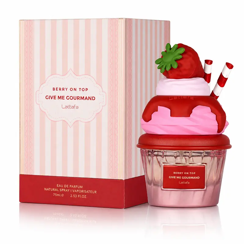 Give Me Gourmand Berry on Top bottle beside its pink striped Lattafa box on a white background