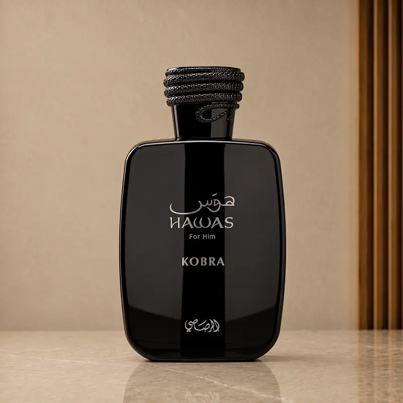 Glossy black Hawas Kobra bottle shown from the front with its coiled cap fitted.