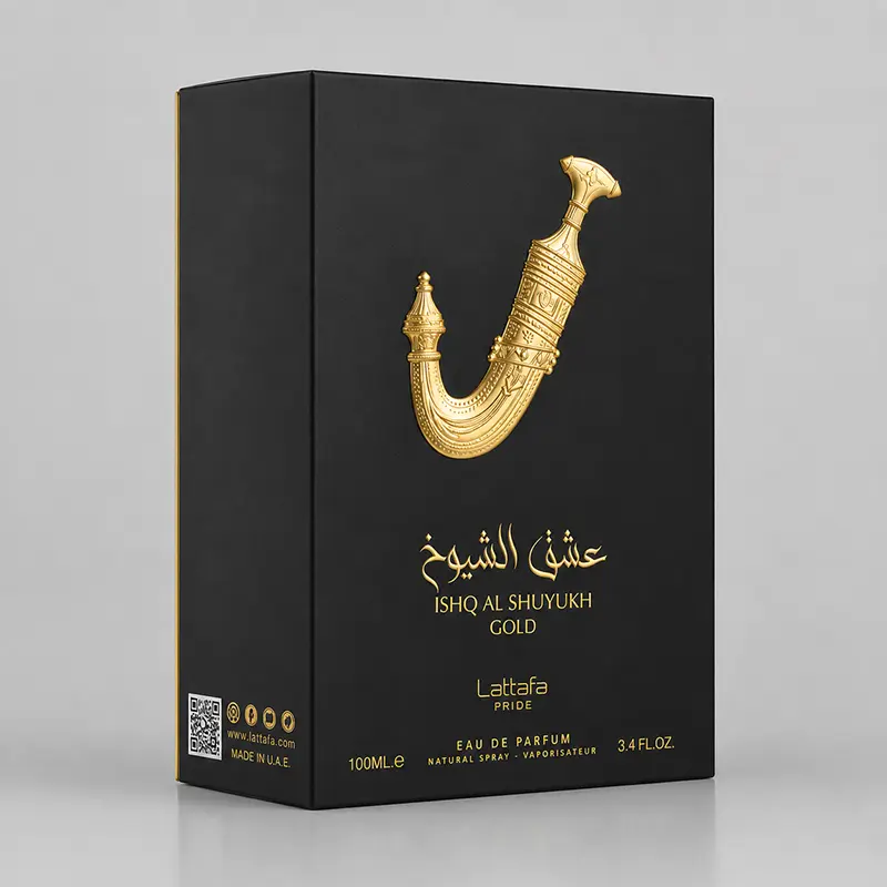 Closeup of the embossed Lattafa Ishq Al Shuyukh Gold luxury packaging showcasing premium detailing.
