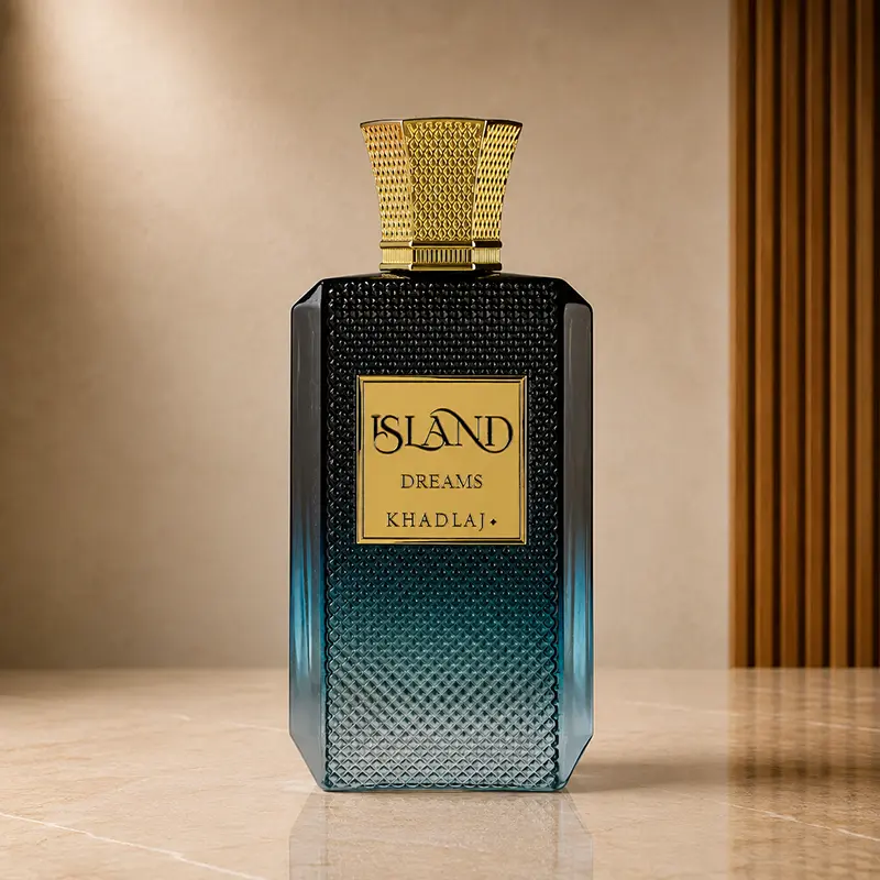 Khadlaj Island Dreams bottle shown front-on with its gold cap and textured dark-to-teal glass.