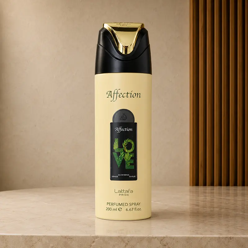 Cream Lattafa Affection perfumed spray with black and gold cap, upright on a beige surface.