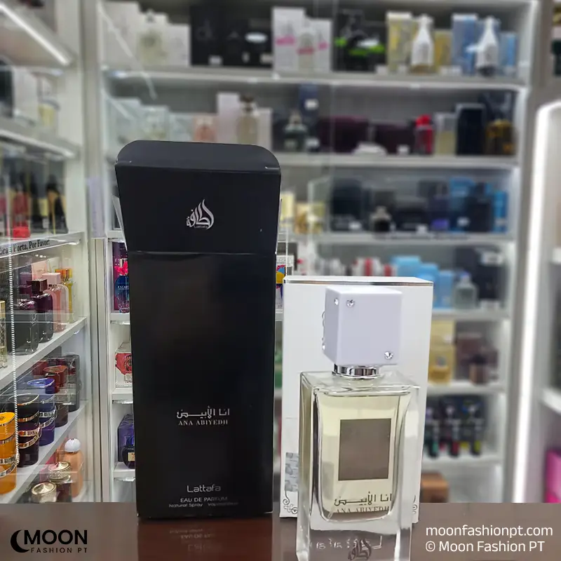 Lattafa Ana Abiyedh perfume bottle and box displayed in a professional fragrance boutique setting.