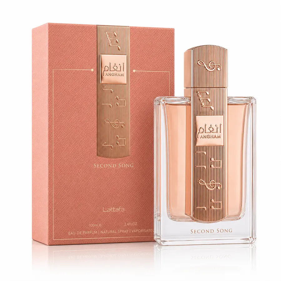 Lattafa Angham Second Song bottle and coral box on white with a soft shadow and reflection.