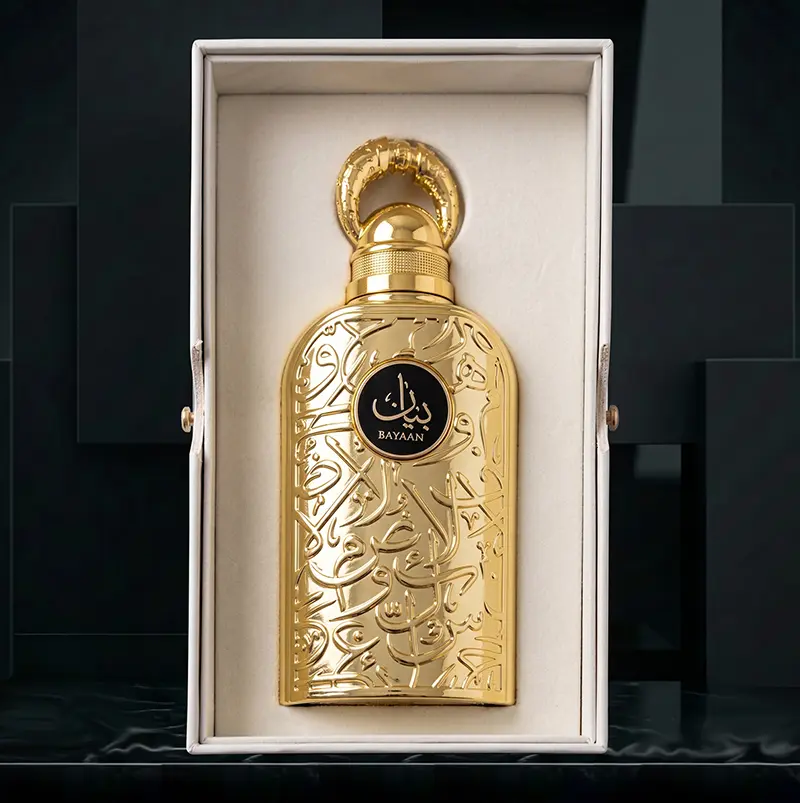 Lattafa Bayaan fragrance resting elegantly inside its premium white inner presentation box.