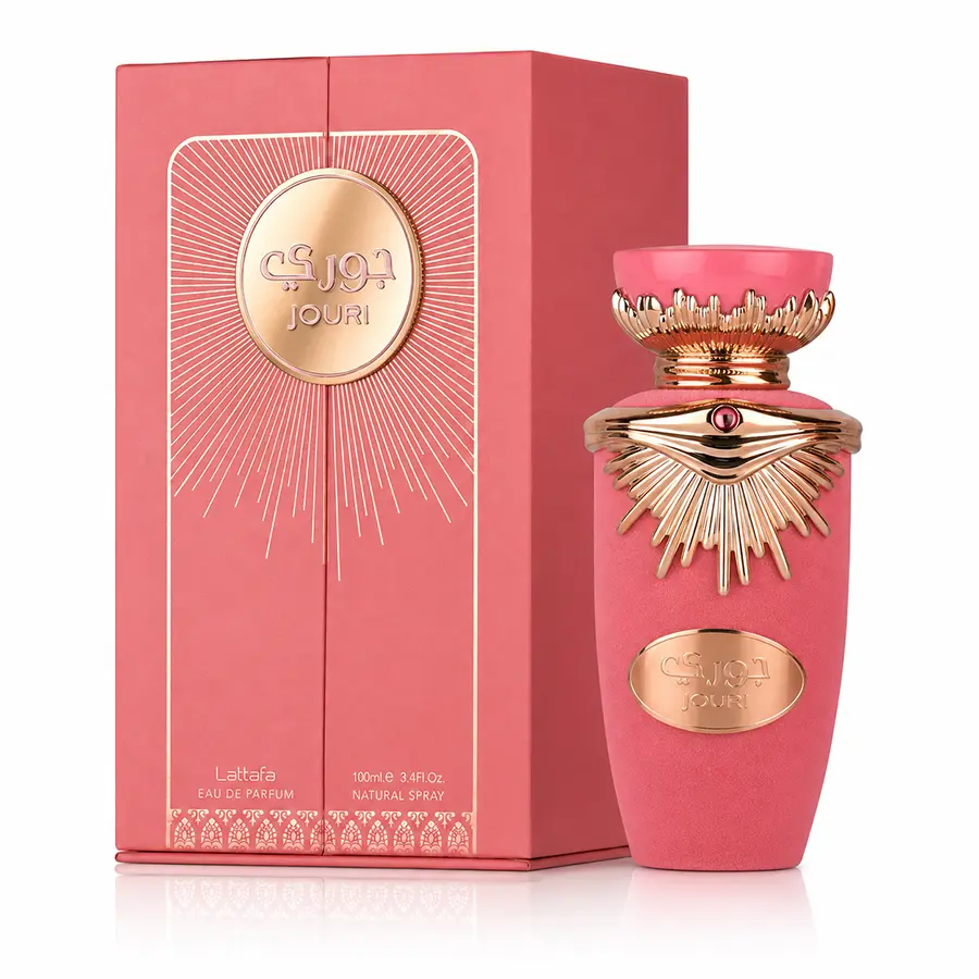 Lattafa Jouri pink perfume bottle and coral presentation box displayed together against white.