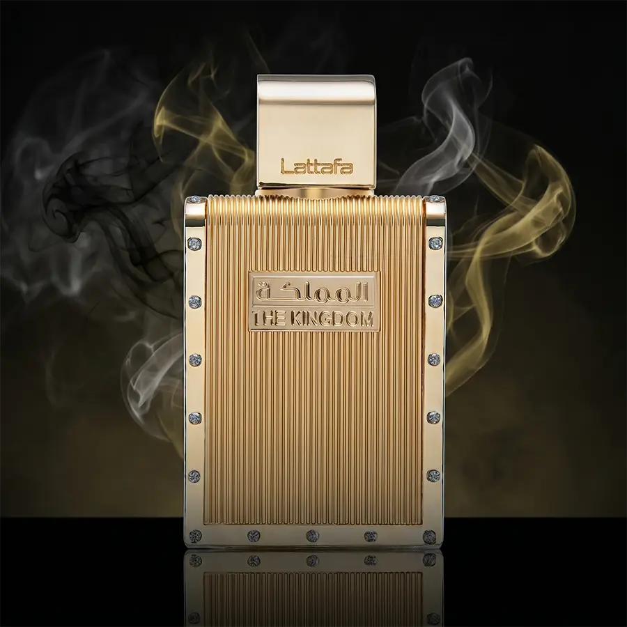 Luxurious gold textured 100ml bottle of Lattafa The Kingdom Men Eau de Parfum with smoke detail.
