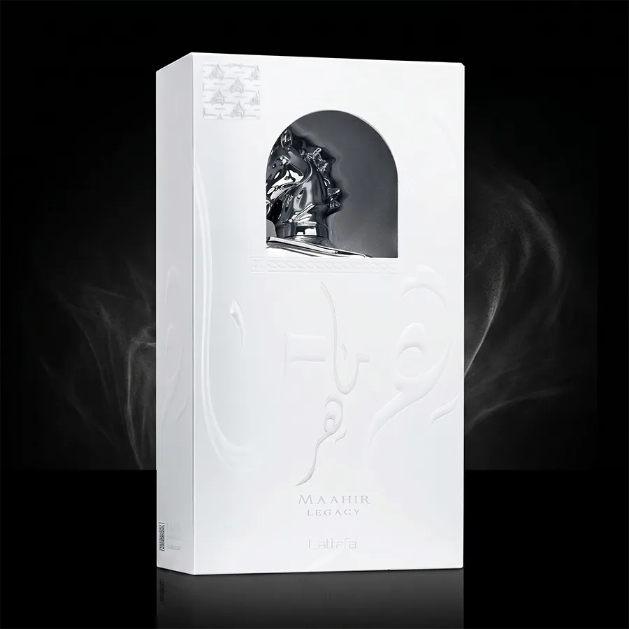 Authentic Lattafa Maahir Legacy for men in a white embossed luxury fragrance packaging box.