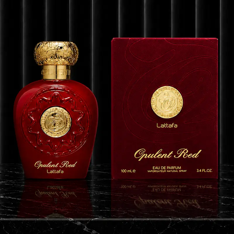 Complete presentation of the 100 ml unisex spray bottle next to its luxury textured outer packaging.