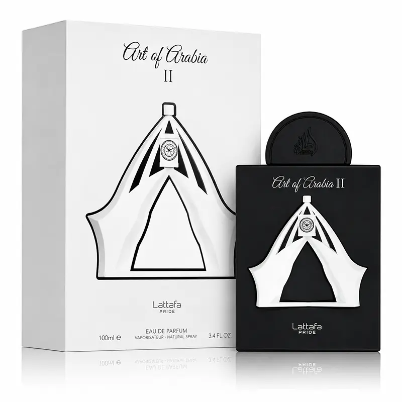 Lattafa Pride Art of Arabia II box and black bottle arranged together on a white reflective background.