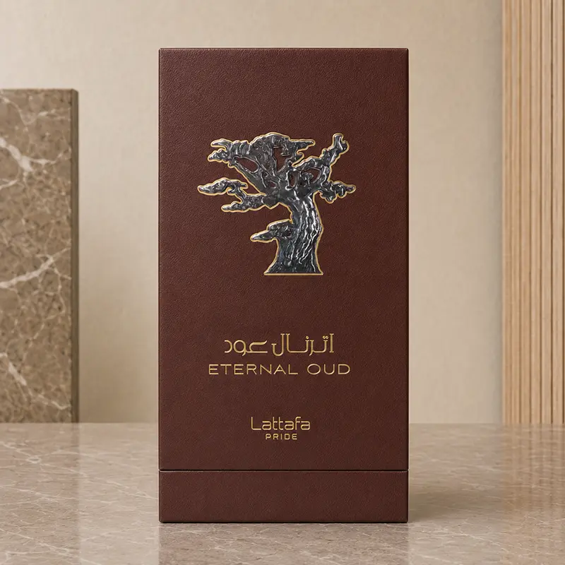 Brown Lattafa Pride Eternal Oud box with leather-like texture, metallic tree emblem and gold lettering
