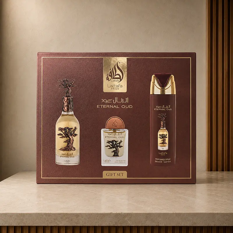 Burgundy Lattafa Pride Eternal Oud gift set box displayed on a marble studio surface