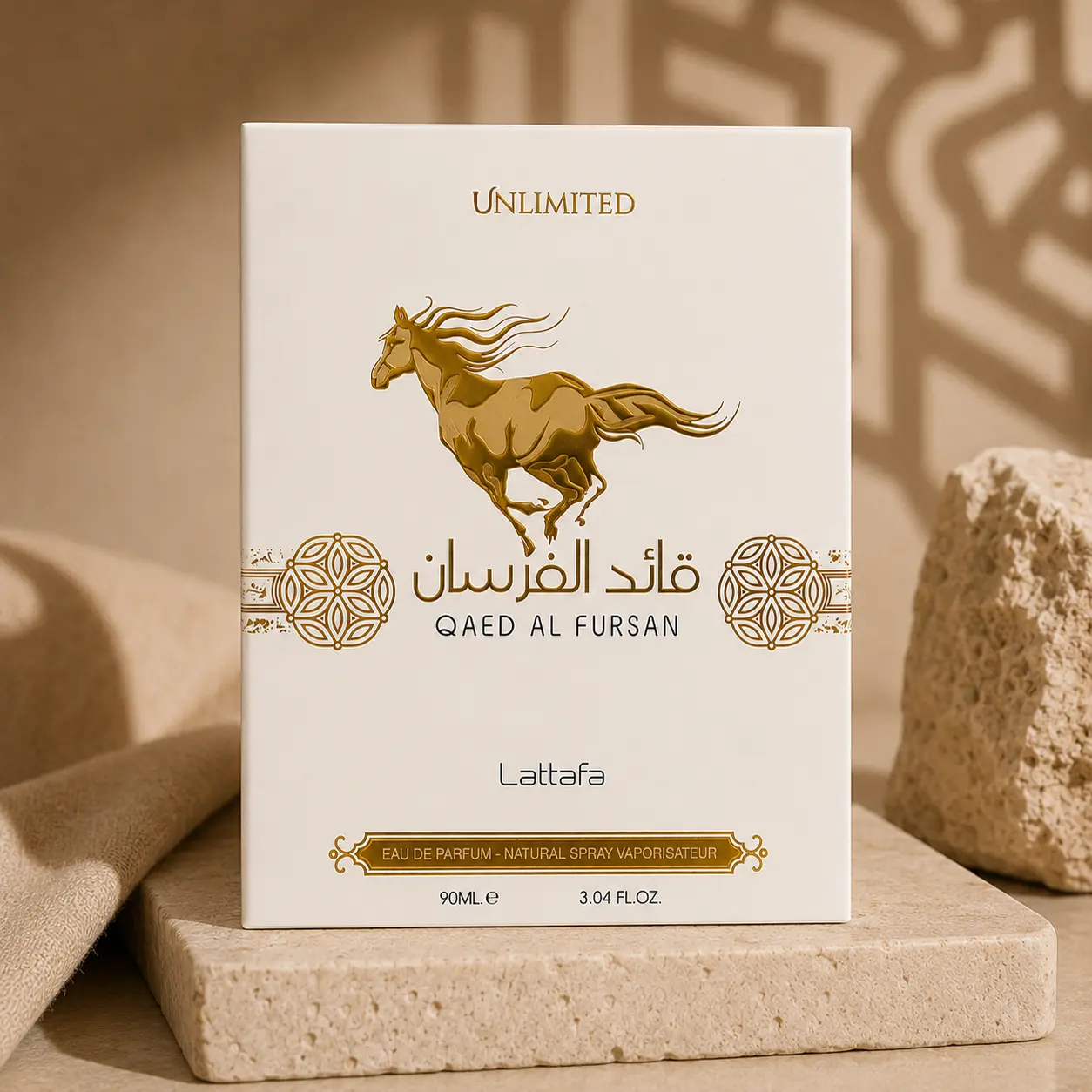 Premium packaging display of Qaed Al Fursan Unlimited with refined gold branding.