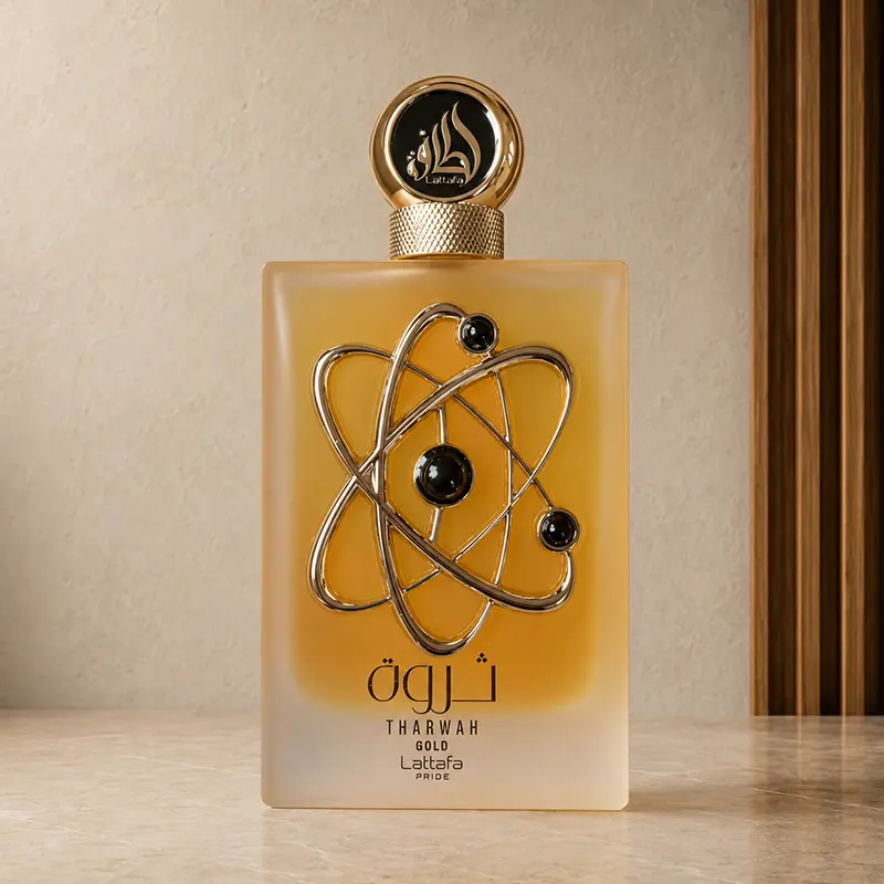 Lattafa Tharwah Gold 100 ml Eau de Parfum bottle with round cap and gold orbit-style front design.