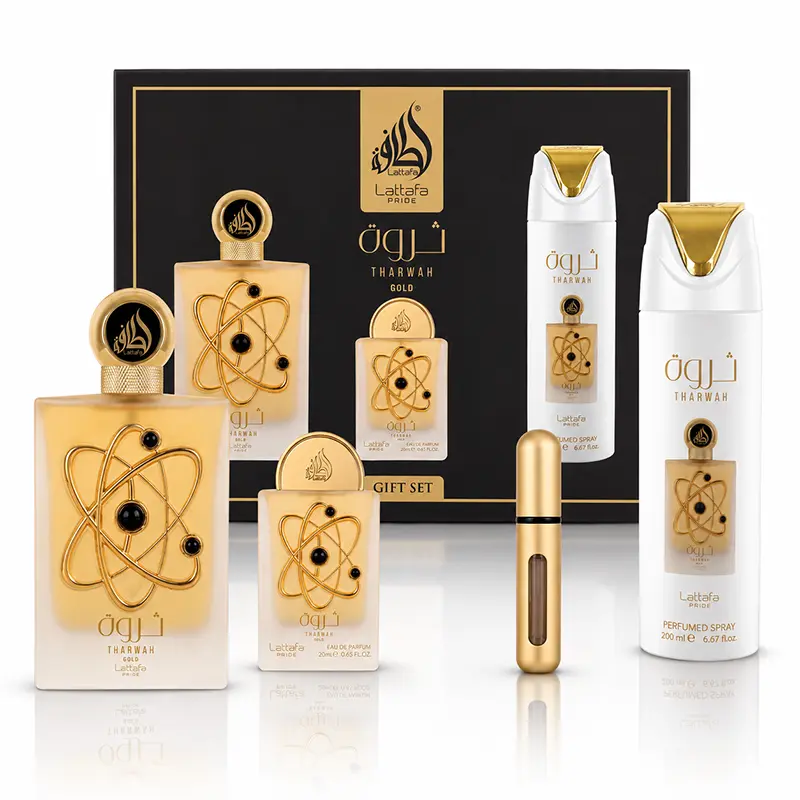 Lattafa Tharwah Gold 3pc gift set display with EDP bottles, perfumed spray and gold atomiser.