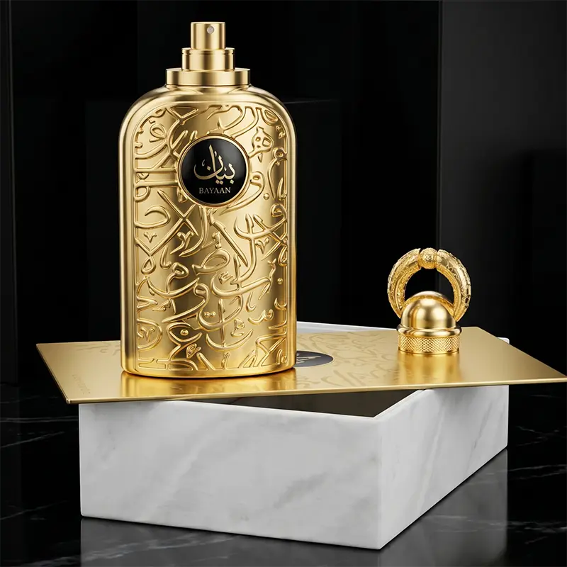 Macro closeup showing the premium spray nozzle and heavy metallic cap of the Lattafa Bayaan bottle.